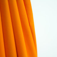 Tissue jersey organique de couleur unie orange